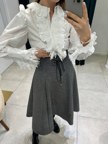 White ruffled blouse