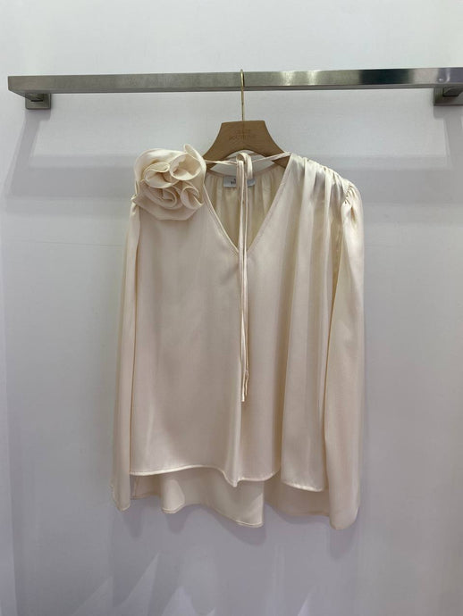 Beige blouse with flower